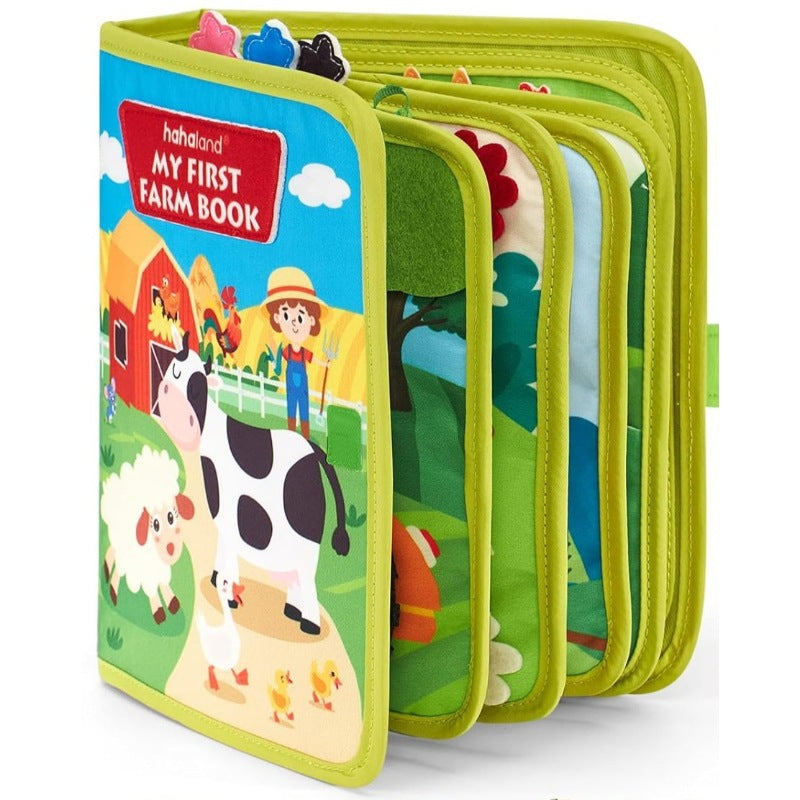 Children's farm-themed book with colorful illustrations on a white background