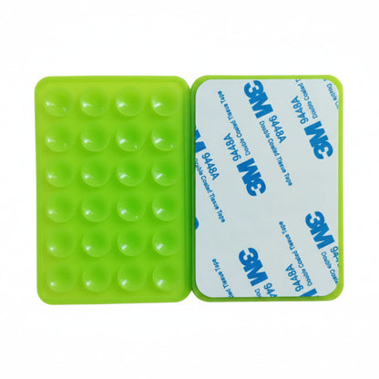 Green silicone mold with 3M adhesive backing on a white background