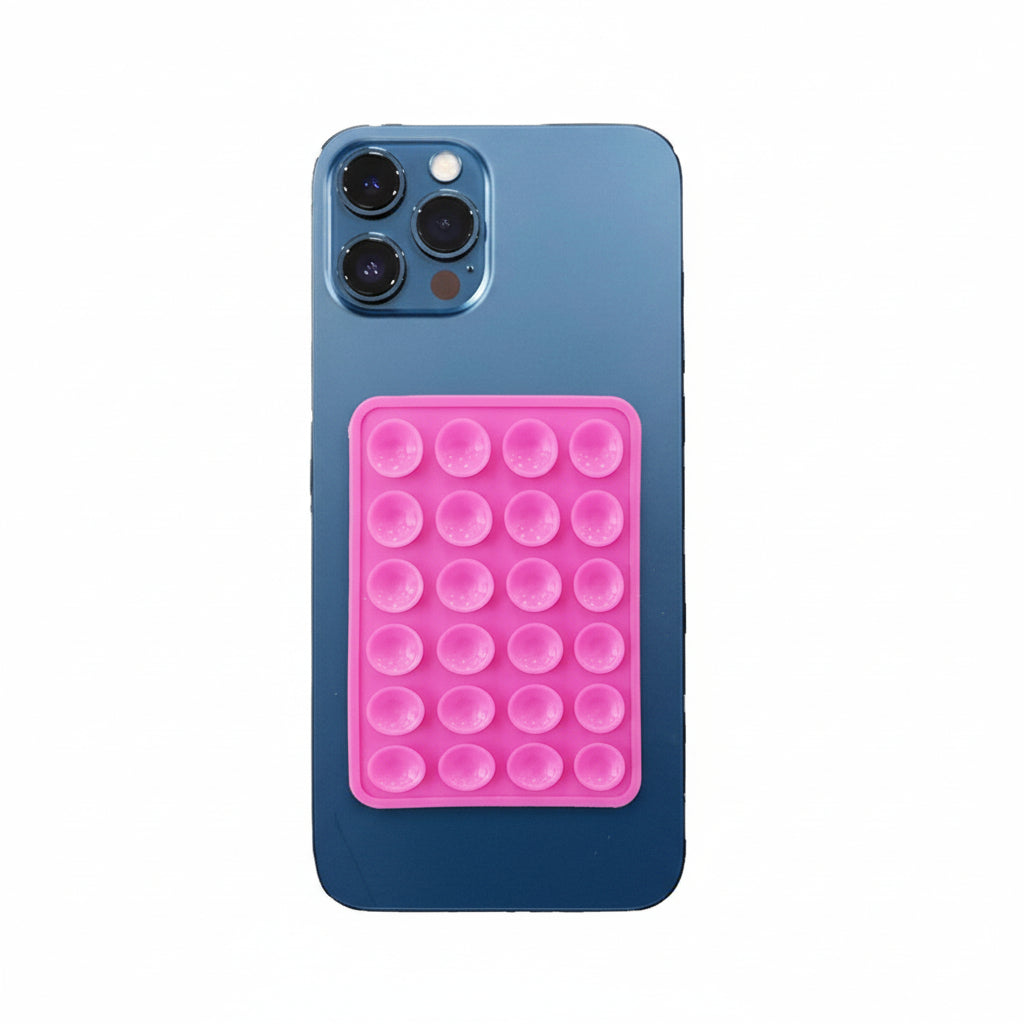 Phone case with pink bubble design phone suction mount on a white background