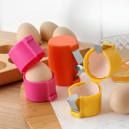 Three colorful egg shell removers on a wooden surface with eggs.