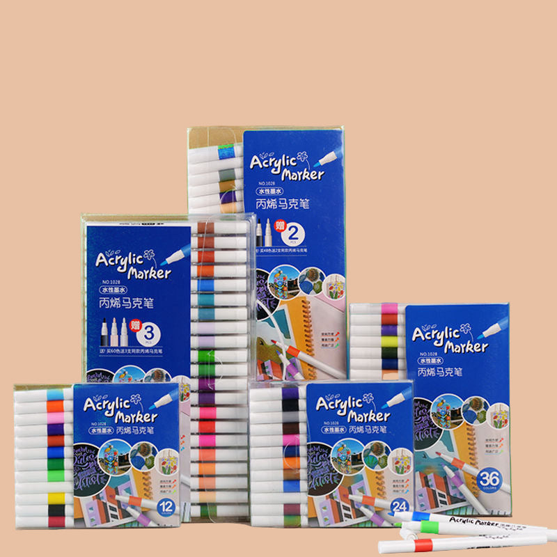 Acrylic marker sets with packaging on a beige background
